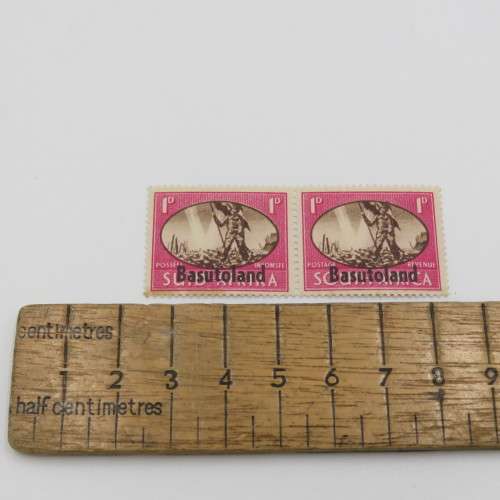 SACC 124 Bechuanaland pair of 1d stamps - Right hand stamp with cap flow