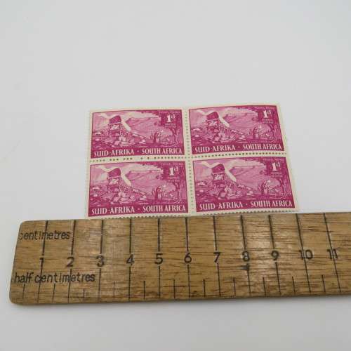 SACC 130 block of 4 x 1d stamps - Top left stamp with large white mark on back of last ox
