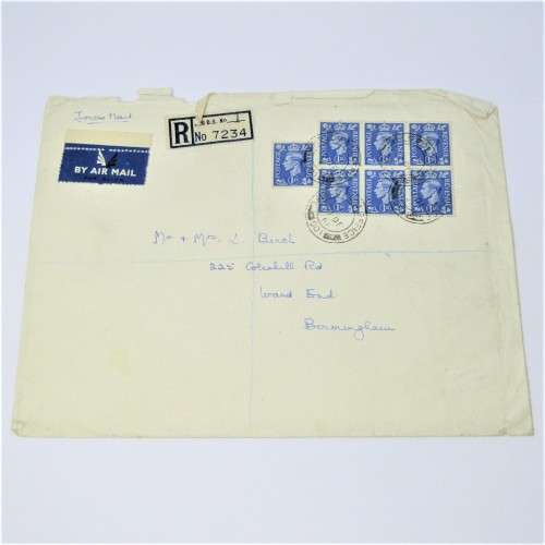 Registered Airmail cover from field post office to Birmingham England with 7 British stamps
