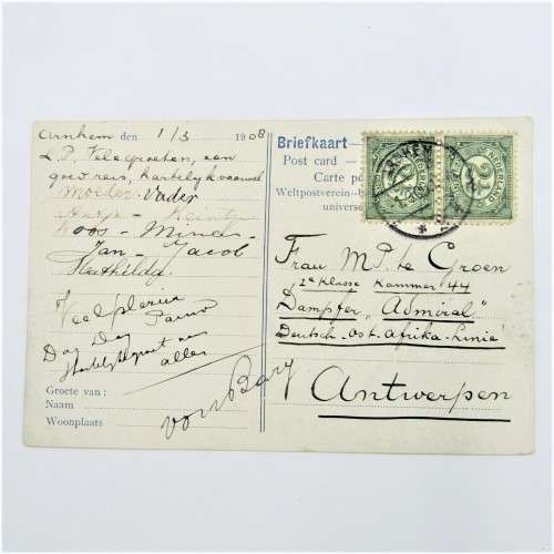Picture post card of the Arnhem post office in Nederland with two Nederland stamps