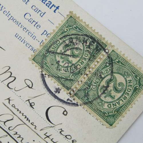Picture post card of the Arnhem post office in Nederland with two Nederland stamps
