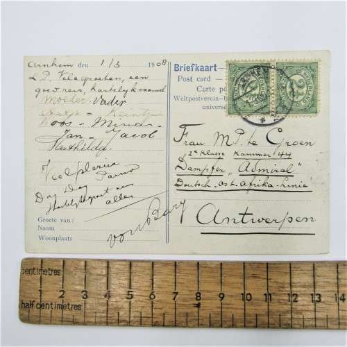 Picture post card of the Arnhem post office in Nederland with two Nederland stamps