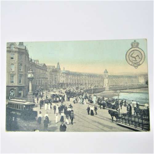 Unused Isle of man post card with picture of street scene with people