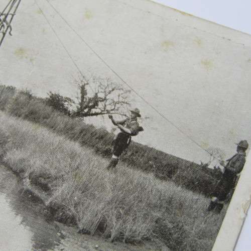 Boy Scouts postcard showing how they send baggage across the river - unused