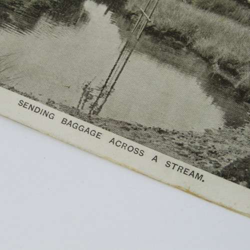 Boy Scouts postcard showing how they send baggage across the river - unused