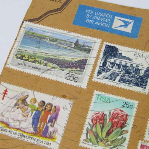 Lot of South African building stamps and others on piece with airmail