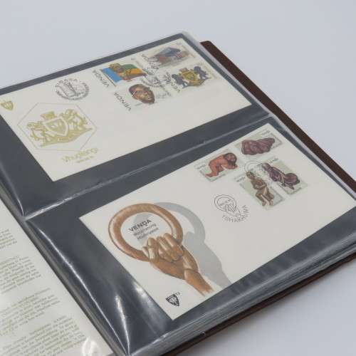 First day cover album with 72 pages and 27 covers and other items - Venda