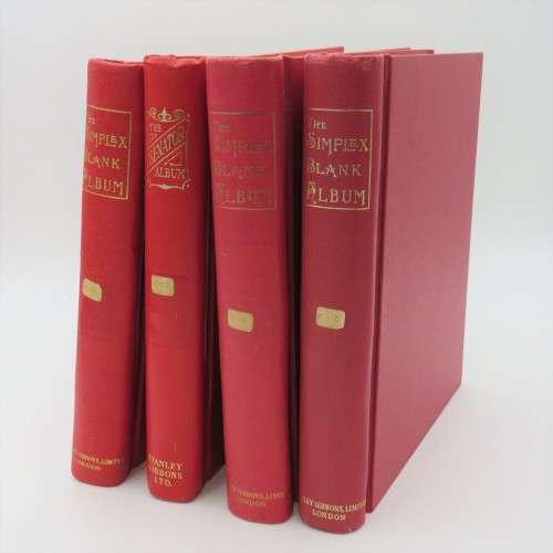 Lot of 4 albums with world stamps sorted by country