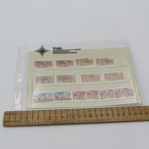 Lot of 9 folders with more than 200 SWA mint stamps