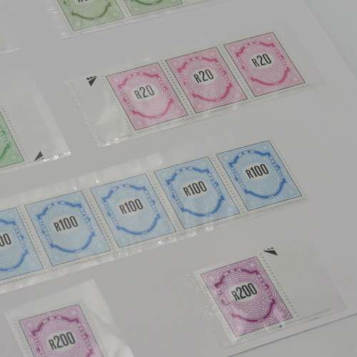 Page with vintage South African income stamps - All mint