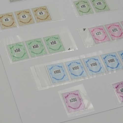 Page with vintage South African income stamps - All mint