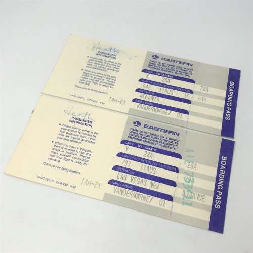 Pair of EASTERN Airways tickets with boarding passes attached - one to Las Vegas and one to Atlanta