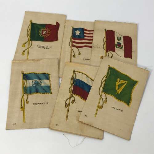 Lot of 27 Flags of all Nations silk cigarette cards on paper backing