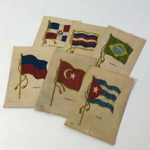 Lot of 27 Flags of all Nations silk cigarette cards on paper backing
