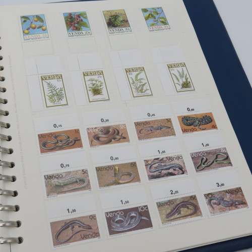 Album with over 1100 stamps including Transkei and Venda mint collections and a lot of USA stamps