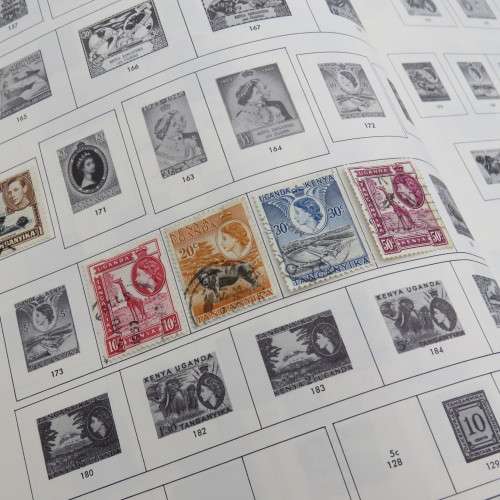 Large old stamp album with over 950 stamps - Many of them uncirculated