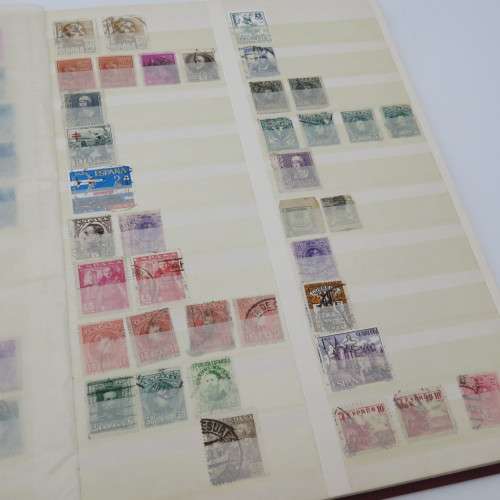 Decent stamp album with almost 1000 stamps - Many of them better value stamps