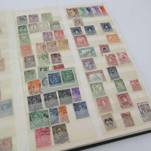 World collection with over 1700 stamps in decent 32 page album - Many better stamps