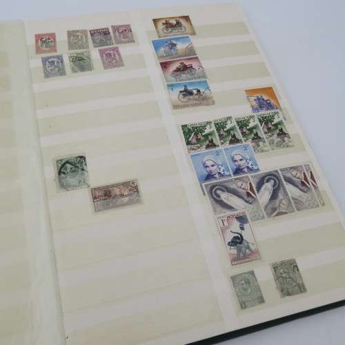 World collection with over 1700 stamps in decent 32 page album - Many better stamps