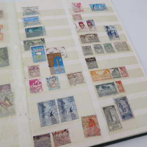 World collection with over 1700 stamps in decent 32 page album - Many better stamps