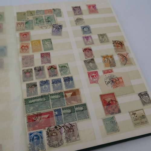 World collection with over 1700 stamps in decent 32 page album - Many better stamps