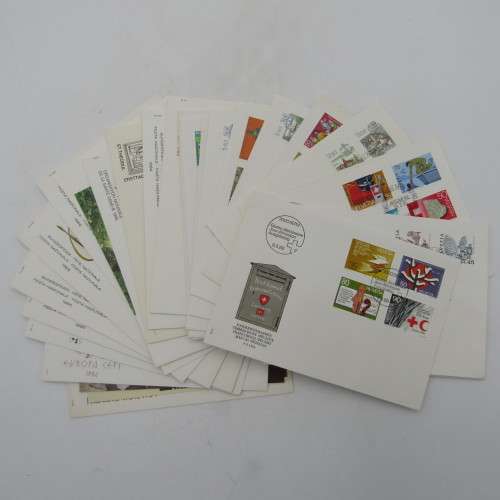 Large lot of Swiss stamps in packets as bought from the swiss philatelic society