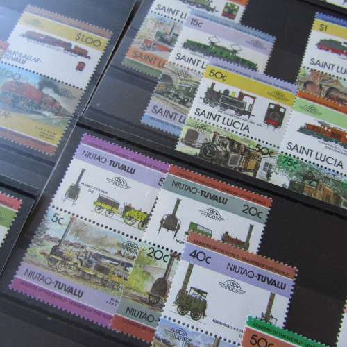 Lot of 91 Train Locomotive stamps - 16 sets on cards - mint