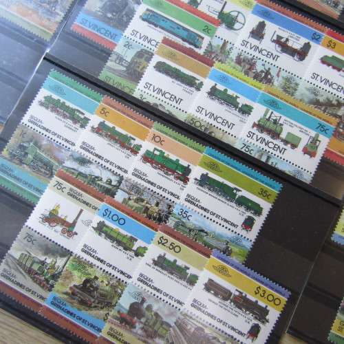 Lot of 91 Train Locomotive stamps - 16 sets on cards - mint