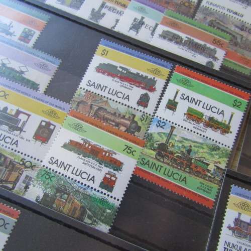 Lot of 91 Train Locomotive stamps - 16 sets on cards - mint