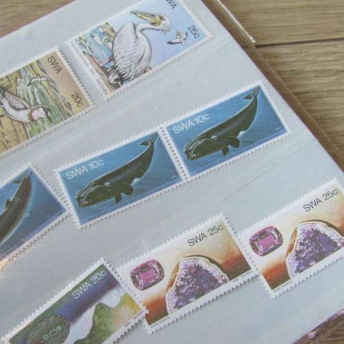Lot of 116 South West Africa mint stamps in folders