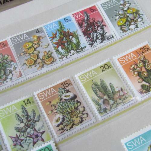 Lot of 116 South West Africa mint stamps in folders