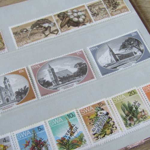Lot of 116 South West Africa mint stamps in folders