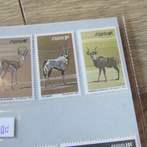 Lot of 116 South West Africa mint stamps in folders