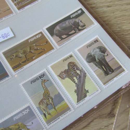 Lot of 116 South West Africa mint stamps in folders