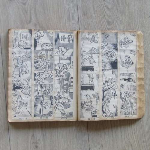 Scrapbook with large variety of WW2 period comic strips