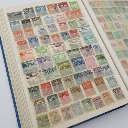 64 Page stamp album with over 2500 world stamps - Not checked