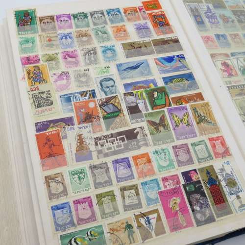 64 Page stamp album with over 2500 world stamps - Not checked