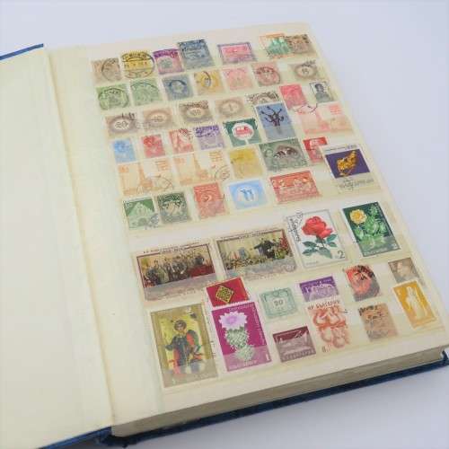 64 Page stamp album with over 2500 world stamps - Not checked