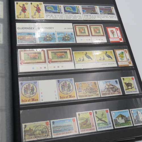 Stamp album with over 1070 stamps - England Jersey Isle of man Gibraltar mint and used
