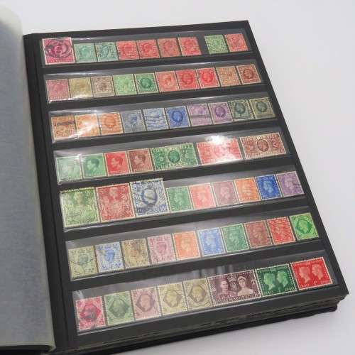 Stamp album with over 1070 stamps - England Jersey Isle of man Gibraltar mint and used