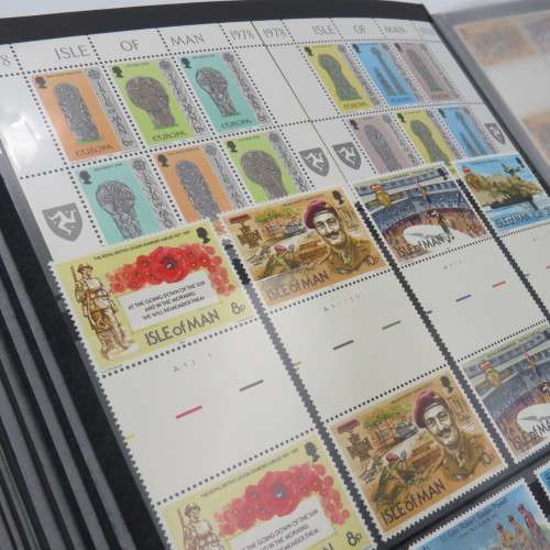 Stamp album with over 1070 stamps - England Jersey Isle of man Gibraltar mint and used