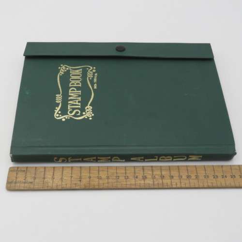 18 Page stamp album with over 700 British stamps - Including penny brown and some scarcer stamps