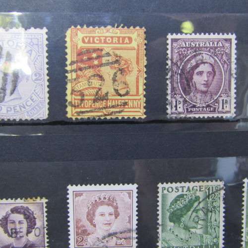 Slip Album with over 1400 stamps from Australia, Cook Islands, New Zealand and more