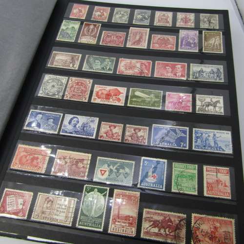 Slip Album with over 1400 stamps from Australia, Cook Islands, New Zealand and more