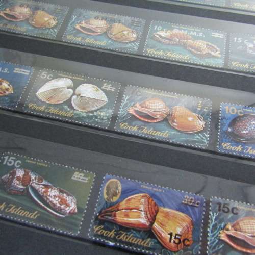 Slip Album with over 1400 stamps from Australia, Cook Islands, New Zealand and more