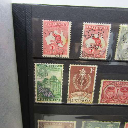 Slip Album with over 1400 stamps from Australia, Cook Islands, New Zealand and more