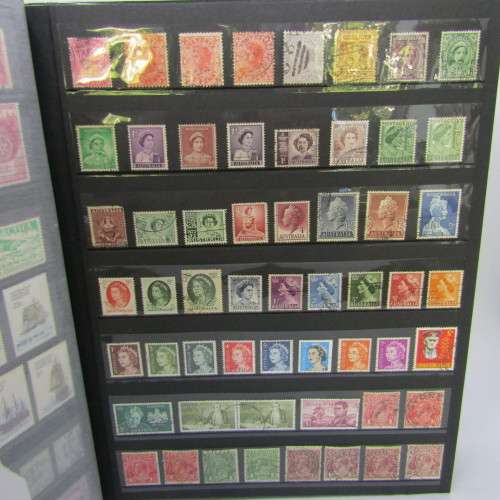 Slip Album with over 1400 stamps from Australia, Cook Islands, New Zealand and more