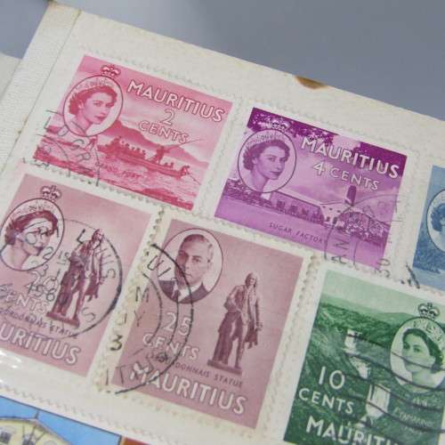 Album with over 1000 stamps - Ascension, Basutoland, Lesotho, Botswana and more