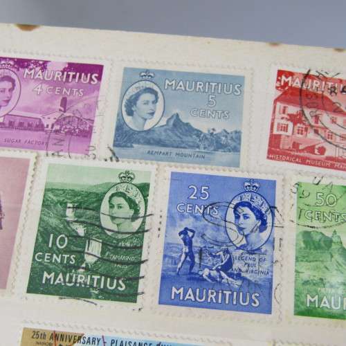 Album with over 1000 stamps - Ascension, Basutoland, Lesotho, Botswana and more