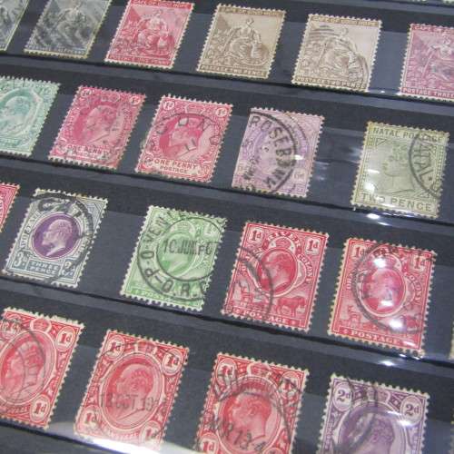 Album with over 1000 stamps - Ascension, Basutoland, Lesotho, Botswana and more